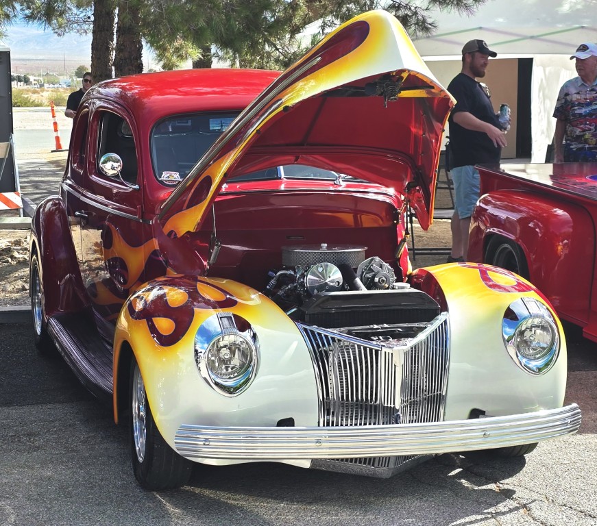 Pahrump Fall Festival Parade & Car Show - image of a classic 1940's chromed coupe with flame fenders.