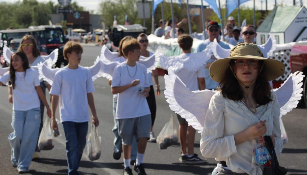 Pahrump Fall Festival Parade & Car Show - image of Choice Hills Baptist Church float and followers.