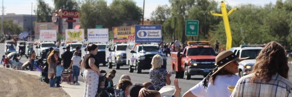 Pahrump Fall Festival Parade & Car Show - image of a row of banner trucks.