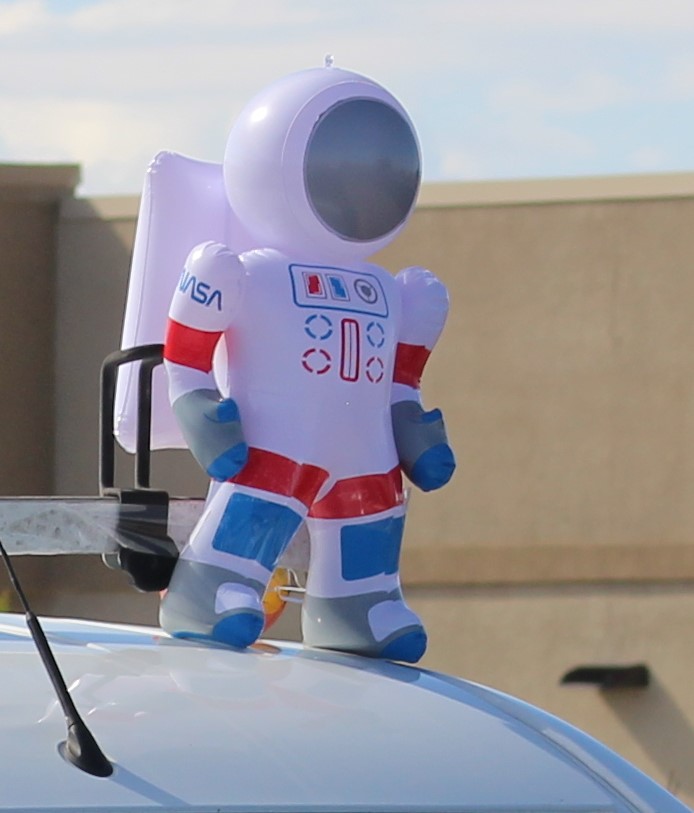 Pahrump Fall Festival Parade & Car Show - image of Rent-2-Go inflatable mini NASA astronaut.