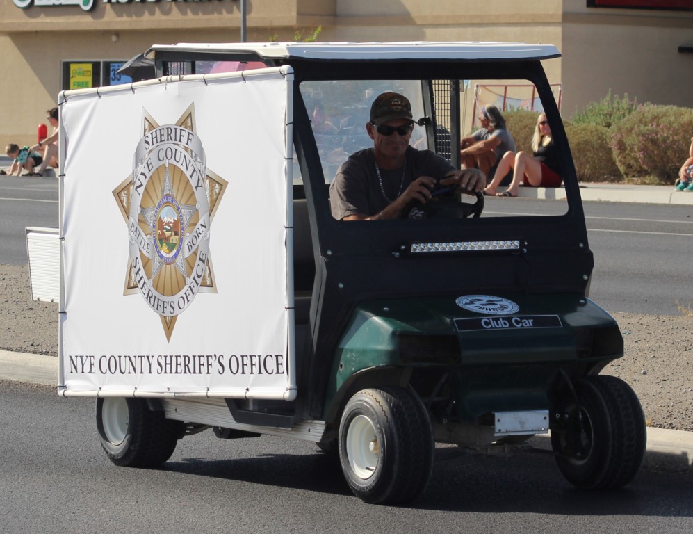 Pahrump Fall Festival Parade & Car Show - image of Nye County Sheriff's Office banner.