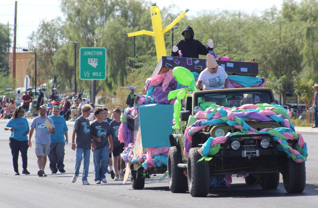 Pahrump Fall Festival Parade & Car Show - image of Pahrump High & Junior school team sports float and  participants.