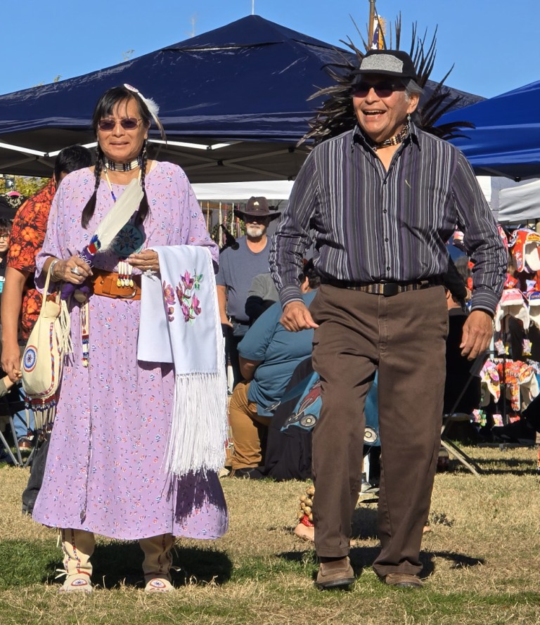 Pahrump Social Powwow 2025: Image of MC Michael Reifel and friend.