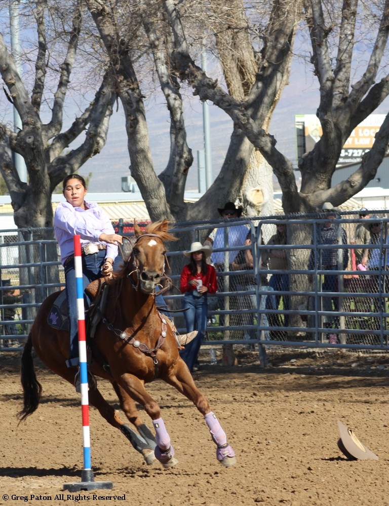 Pole-bending event, contestant races to finish of time trials at McCullough Arena, Pahrump Nevada, as seen in rodeos: Alamo; Alamo HS; Battle Mountain; Battle Mountain HS; Boulder City; Boulder City HS; Pahrump; Pahrump Valley; Pahrump Valley HS; Elko; Elko HS; Eureka; Eureka HS; Fallon; Fallon HS; Fernley; Fernley HS; Humboldt; Humboldt HS; Las Vegas; Moapa Valley; Moapa Valley HS; Spanish Springs; Spanish Springs HS; Washoe; Washoe HS; Wells; Wells HS; White Pine; White Pine HS; NSHSRA; Priefert Pavilion; & South Point; Petrack; & Petrack Park.