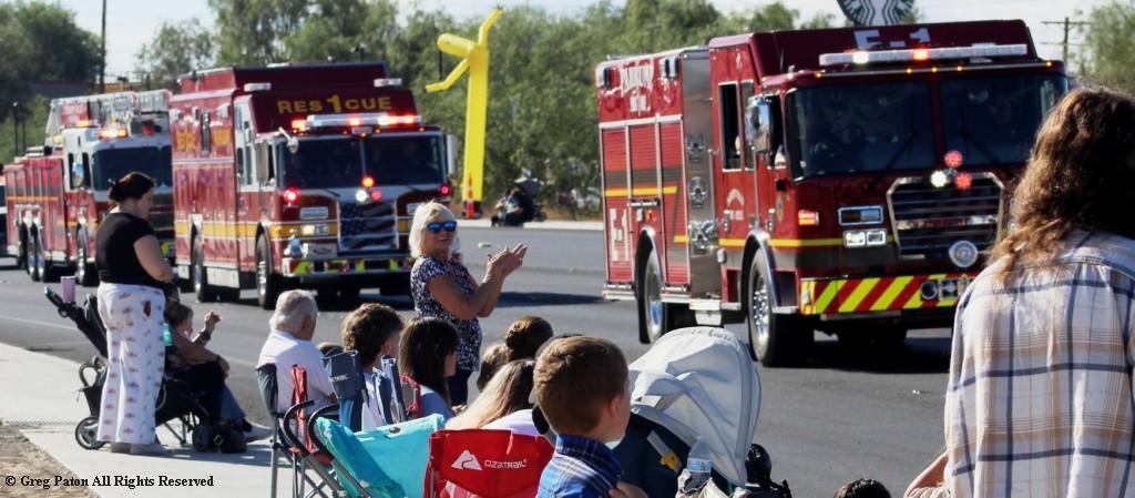 Pahrump Fall Festival Parade & Car Show column of fire engines.