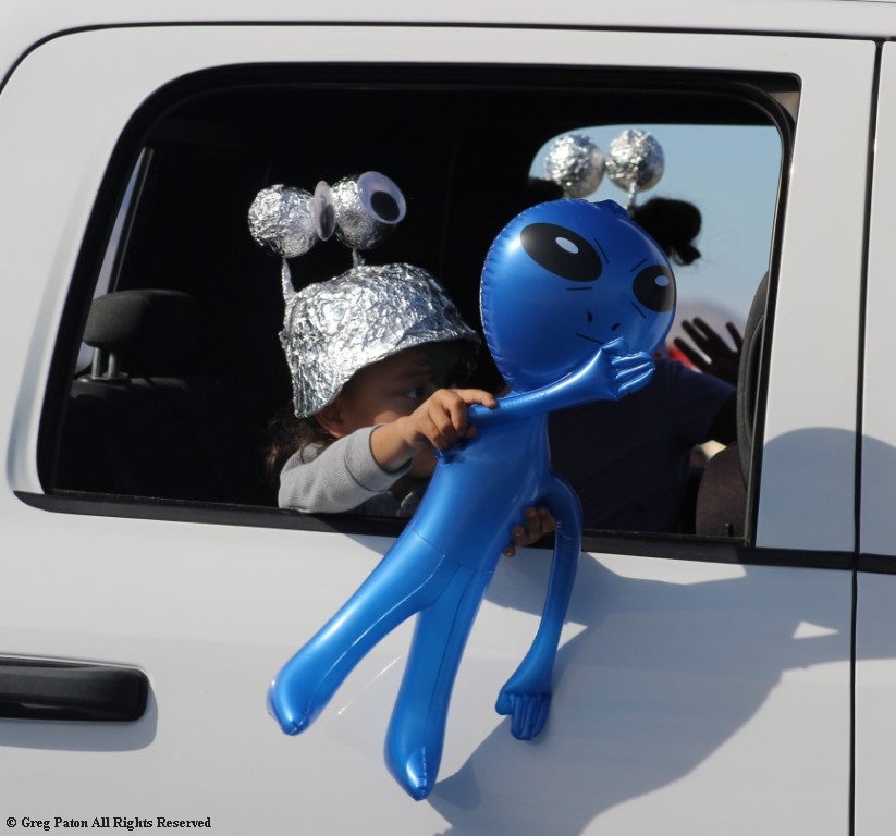 Pahrump Fall Festival Parade & Car Show child with blue alien.