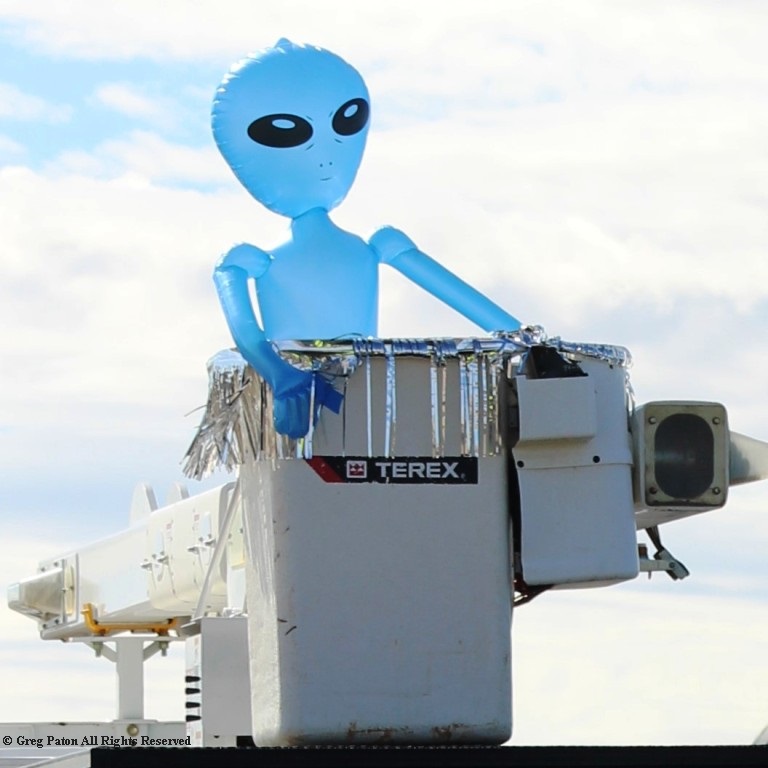 Pahrump Fall Festival Parade & Car Show blue alien in cherry-picker