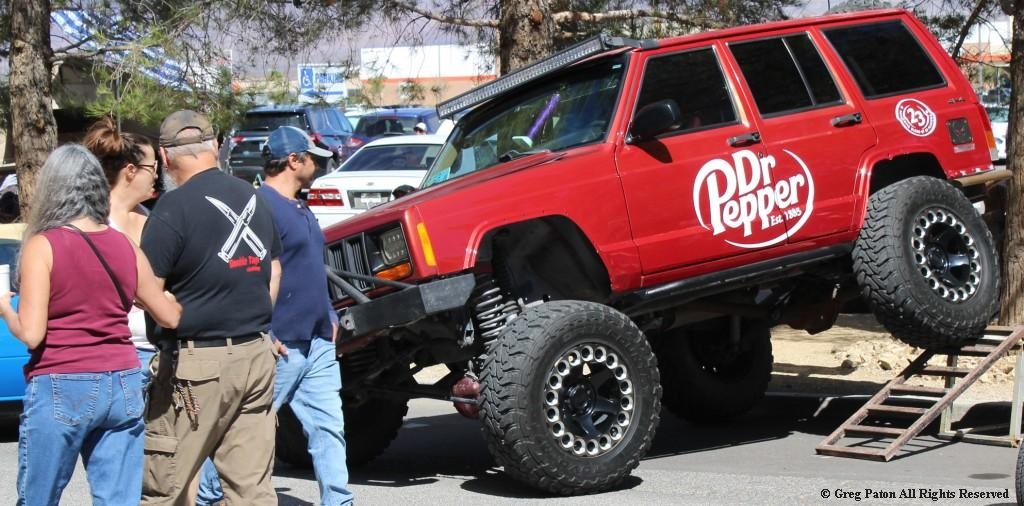 2026 Pahrump Fall Festival Parade & Car Show as fans eye the Jeep Cherokee off-road vehicle.